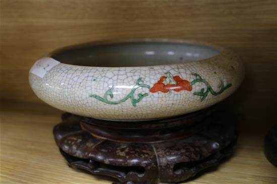 Three Chinese hardwood stands and three bowls